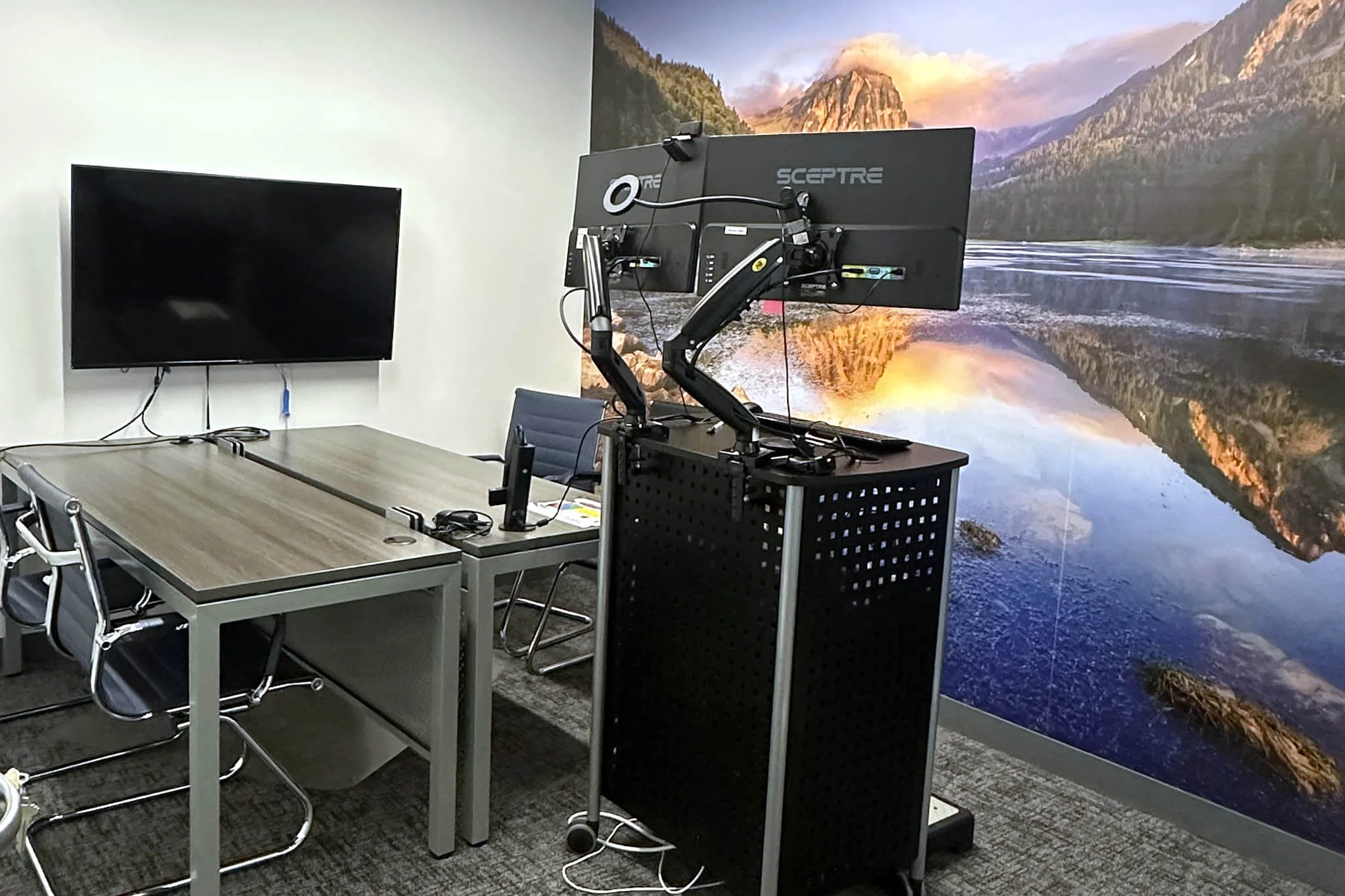 A conference room in YuJa's Office featuring a large, vibrant wall mural that enhances the meeting space's atmosphere.